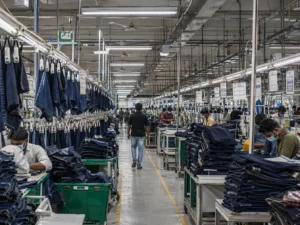 busy denim factory assembly line scene