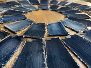 multiple denim wash swatches showing subtle shade differences during wash selection